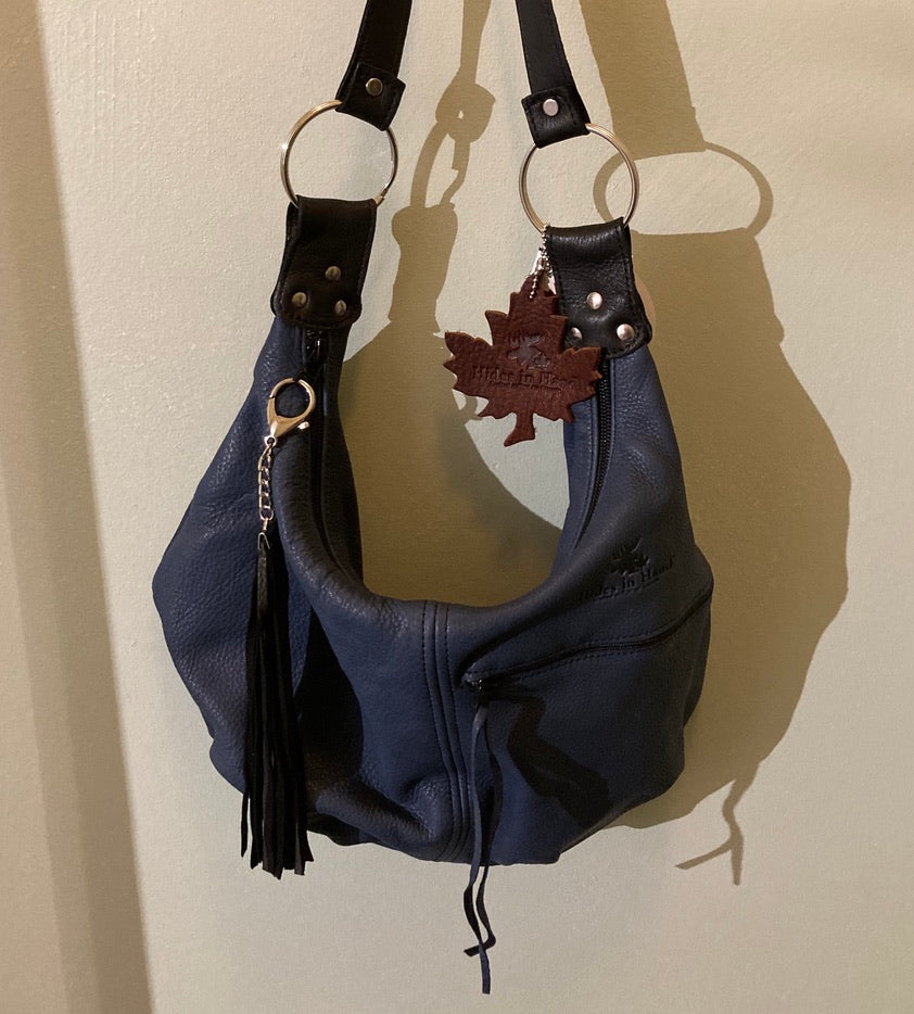 Hides in Hand Bag - Hand Bag