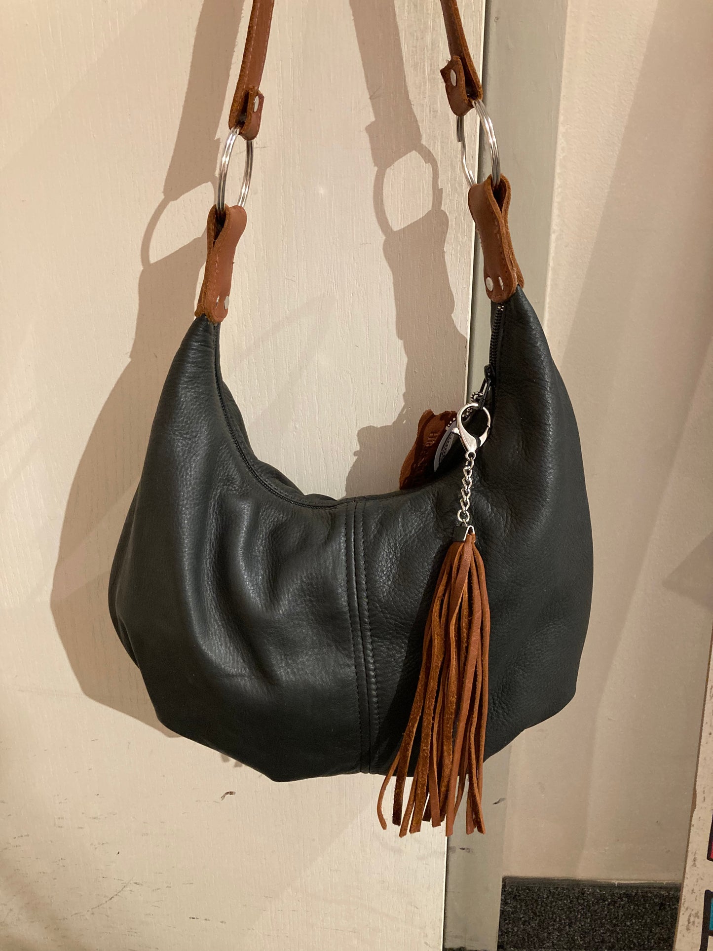 Hides in Hand Bag - Anita